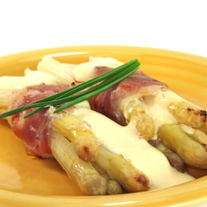 White Asparagus Covered in Hollandaise Sauce