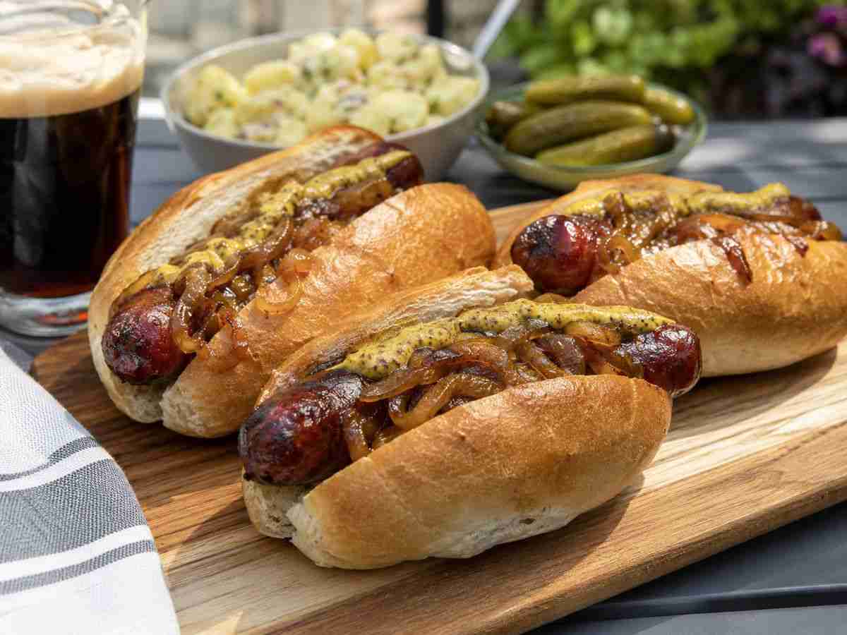 German beer-basted knockwurst with caramelized onions, hot Düsseldorf mustard, and crusty buns