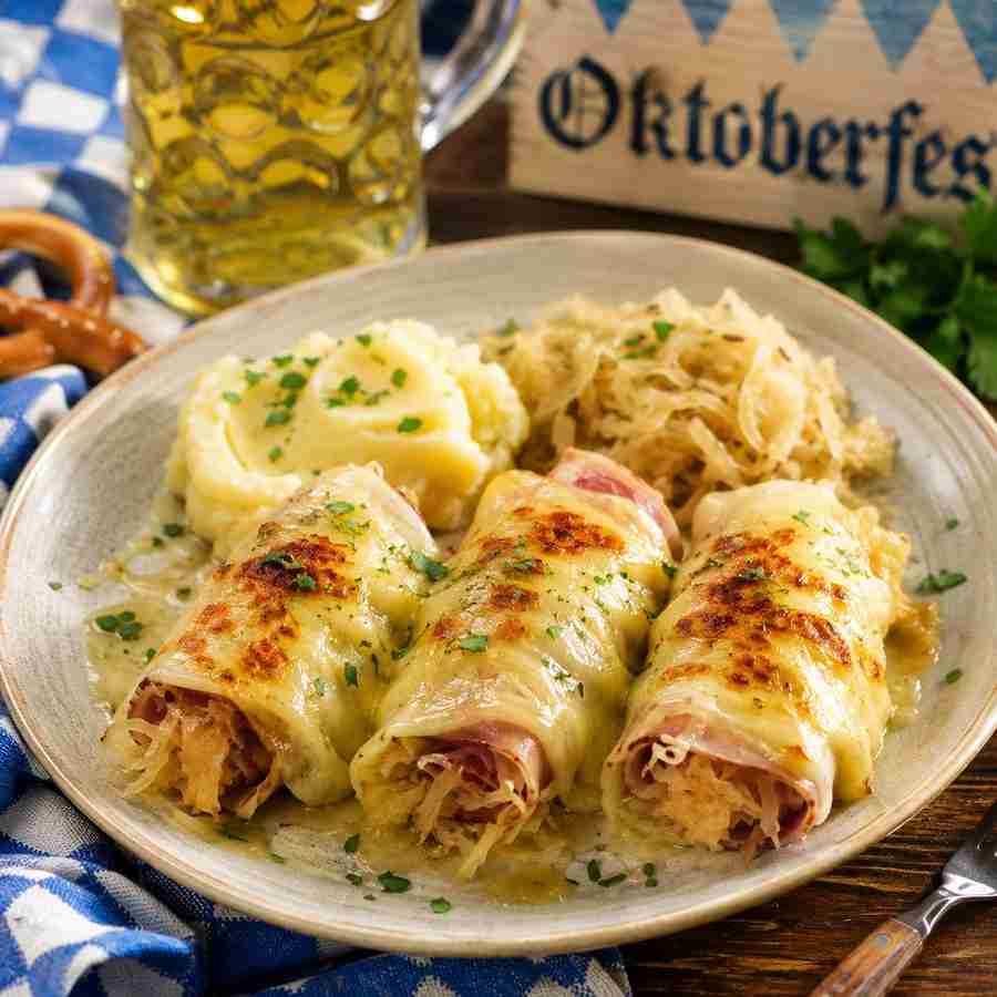 Savory German sauerkraut and ham rolls with bacon, pork, Emmentaler cheese, mustard, and sour cream